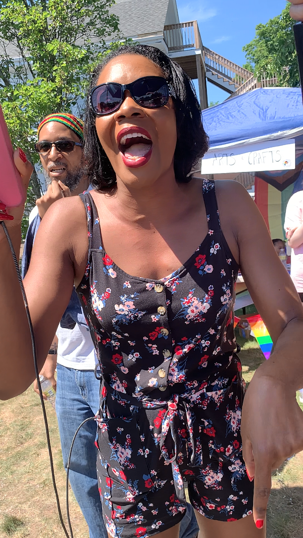 Rayla Campbell yells at organizers of the Pride Month event at the Holbrook Public Library on June 25. (Credit: Holbrook United for Change)